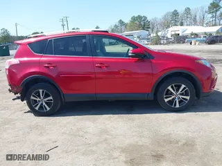 2016 Toyota RAV4 XLE with VIN JTMWFREV6GJ099056, listed as a IAAI auction lot 41941541 with 137,154 mi miles. Bid and sale history available at carsss.com. Image 13.