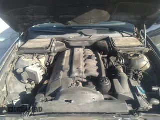 1997 BMW 5 Series 528iA with VIN WBADD6328VBW23350, listed as a IAAI auction lot 41707835 with 272,299 mi miles. Bid and sale history available at carsss.com. Image 10.