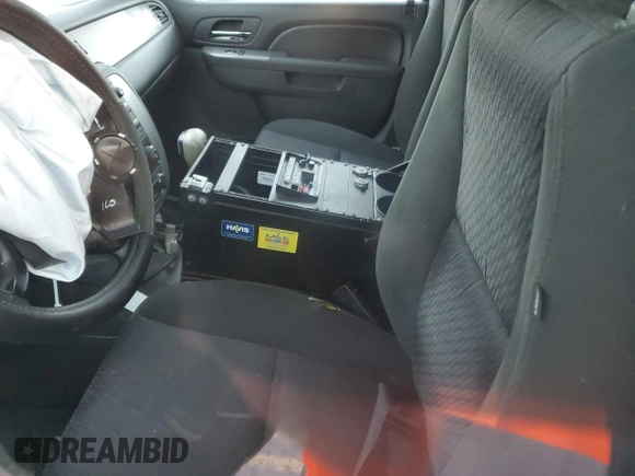 2012 Chevrolet Tahoe Commercial with VIN 1GNSK2E03CR163577, listed as a Copart auction lot 84611234 with 98,056 mi miles and Salvage title. Bid and sale history available at DreamBid. Image 7.