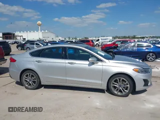 2019 Ford Fusion SEL with VIN 3FA6P0CD2KR116863, listed as a IAAI auction lot 42011256 with 72,676 mi miles. Bid and sale history available at carsss.com. Image 13.