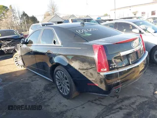 2012 Cadillac CTS Performance with VIN 1G6DJ5E37C0108606, listed as a IAAI auction lot 41497567 with 138,597 mi miles and . Bid and sale history available at DreamBid. Image 3.