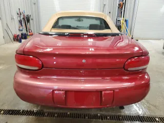 1996 Chrysler Sebring z VIN 3C3EL45X7TT267559, wystawiony jako Copart lot #56020395 z przebiegiem 66 026 mil mil oraz Tytuł czysty. Historia ofert i sprzedaży dostępna na DreamBid. Obrazek 6.