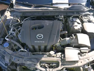 2021 Mazda 3 S z VIN JM1BPAAL8M1321402, wystawiony jako IAAI lot #41693911 z przebiegiem 35 144 mil mil oraz . Historia ofert i sprzedaży dostępna na DreamBid. Obrazek 10.
