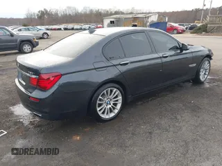 2015 BMW 7 Series 750i xDrive with VIN WBAYB6C56FG299238, listed as a IAAI auction lot 41441393 with 62,396 mi miles. Bid and sale history available at carsss.com. Image 4.