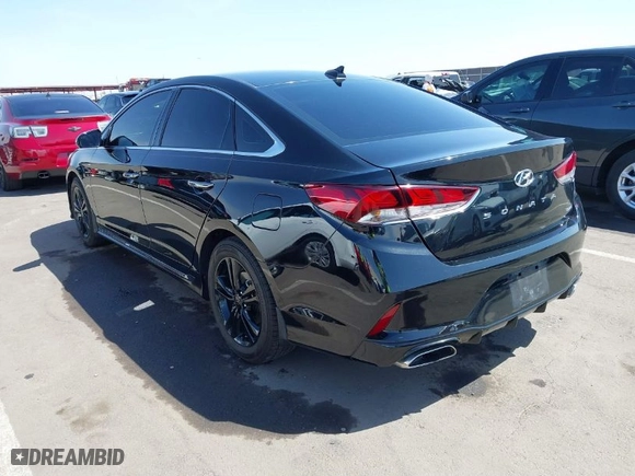 2019 Hyundai Sonata Sport with VIN 5NPE34AF2KH792374, listed as a IAAI auction lot 41987740 with 77,209 mi miles. Bid and sale history available at carsss.com. Image 3.