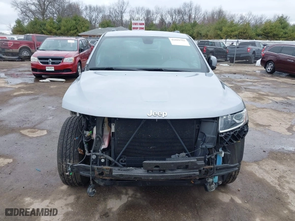 2015 Jeep Grand Cherokee Altitude with VIN 1C4RJFAG0FC657942, listed as a IAAI auction lot 41899793 with 102,277 mi miles. Bid and sale history available at carsss.com. Image 13.