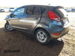 2019 Ford Fiesta SE with VIN 3FADP4EJ8KM101816, listed as a IAAI auction lot 41615459 with 71,028 mi miles. Bid and sale history available at carsss.com. Image 3.