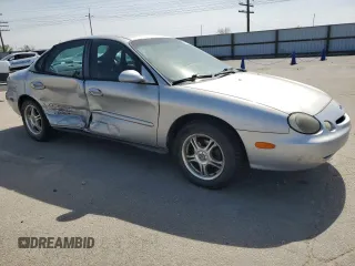 1996 Ford Taurus GL with VIN 1FALP52U7TA299996, listed as a Copart auction lot 53387685 with 175,029 mi miles and Salvage title. Bid and sale history available at DreamBid. Image 4.