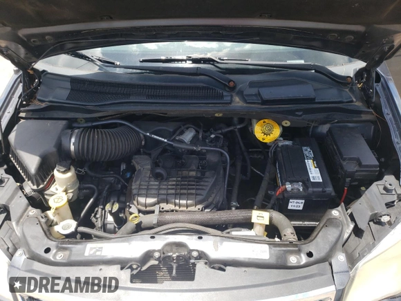2014 Chrysler Town & Country Touring with VIN 2C4RC1BG8ER435294, listed as a Copart auction lot 63109614 with 176,590 mi miles and Salvage Title. Bid and sale history available at DreamBid. Image 12.