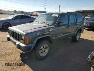 2000 Jeep Cherokee with VIN 1J4FF48S0YL198802, listed as a Copart auction lot 59996915 with 249,756 mi miles and Salvage title. Bid and sale history available at DreamBid. Image 1.