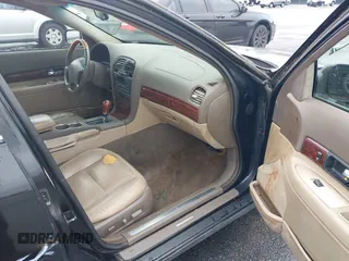 2001 Lincoln LS w/Base Pkg z VIN 1LNHM87A11Y601193, wystawiony jako IAAI lot #42341770 z przebiegiem 187 845 mil mil oraz . Historia ofert i sprzedaży dostępna na DreamBid. Obrazek 5.