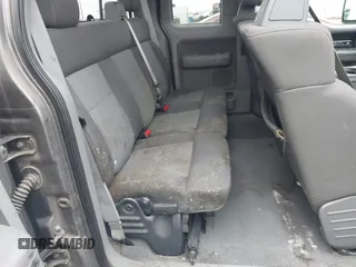 2005 Ford F-150 STX with VIN 1FTRX12W65NA60997, listed as a IAAI auction lot 41836976 with 170,400 mi miles. Bid and sale history available at carsss.com. Image 8.