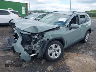 2019 Toyota RAV4 XLE with VIN JTMW1RFV7KD035614, listed as a IAAI auction lot 41970954 with 60,377 mi miles and . Bid and sale history available at DreamBid. Image 22.