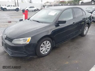 2013 Volkswagen Jetta Sedan S with VIN 3VW2K7AJ2DM390392, listed as a IAAI auction lot 41764483 with 159,834 mi miles. Bid and sale history available at carsss.com. Image 2.