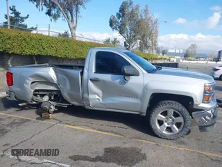 2014 Chevrolet Silverado 1500 with VIN 1GCNCREH2EZ303297, listed as a IAAI auction lot 41692877 with 115,621 mi miles and . Bid and sale history available at DreamBid. Image 13.