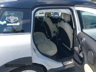 2015 MINI Countryman z VIN WMWZB3C53FWR43884, wystawiony jako IAAI lot #42336430 z przebiegiem 111 934 mil mil oraz . Historia ofert i sprzedaży dostępna na DreamBid. Obrazek 8.