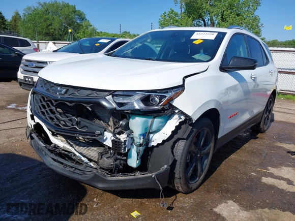2021 Chevrolet Equinox Premier z VIN 2GNAXNEV9M6120241, wystawiony jako IAAI lot #42222928 z przebiegiem 104 274 mil mil oraz . Historia ofert i sprzedaży dostępna na DreamBid. Obrazek 2.