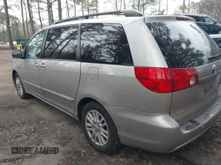 2008 Toyota Sienna XLE with VIN 5TDZK22C28S220219, listed as a IAAI auction lot 41879397 with 210,453 mi miles. Bid and sale history available at carsss.com. Image 3.