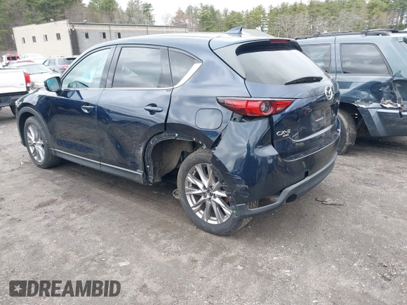 2020 Mazda CX-5 Grand Touring with VIN JM3KFBDM7L1723852, listed as a IAAI auction lot 41848152 with 85,099 mi miles. Bid and sale history available at carsss.com. Image 3.