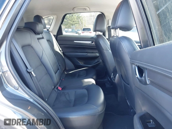 2017 Mazda CX-5 Touring with VIN JM3KFBCL3H0214881, listed as a IAAI auction lot 41694560 with 64,609 mi miles. Bid and sale history available at carsss.com. Image 8.