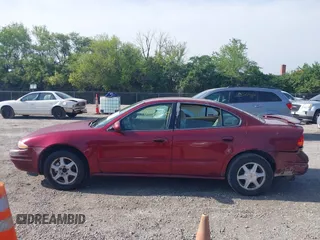 2002 Oldsmobile Alero GL1 z VIN 1G3NL52E02C215561, wystawiony jako IAAI lot #42230290 z przebiegiem 177 176 mil mil oraz . Historia ofert i sprzedaży dostępna na DreamBid. Obrazek 15.