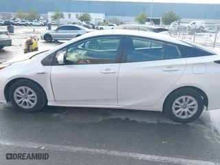 2019 Toyota Prius L Eco with VIN JTDKARFU7K3093038, listed as a IAAI auction lot 41768066 with 124,495 mi miles. Bid and sale history available at carsss.com. Image 14.