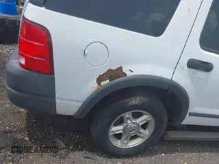 2004 Ford Explorer XLS z VIN 1FMZU72KX4UB30784, wystawiony jako IAAI lot #42364969 z przebiegiem Nie podano mil oraz . Historia ofert i sprzedaży dostępna na DreamBid. Obrazek 6.