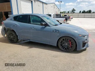 2023 Maserati Levante with VIN ZN661YUM5PX411140, listed as a Copart auction lot 65411165 with 12,053 mi miles and Salvage title. Bid and sale history available at DreamBid. Image 4.