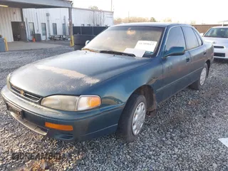 1996 Toyota Camry DX with VIN JT2BG12K2T0416797, listed as a IAAI auction lot 41789017 with 312,858 mi miles. Bid and sale history available at carsss.com. Image 2.