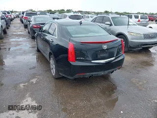 2014 Cadillac ATS Luxury AWD z VIN 1G6AH5R30E0150854, wystawiony jako IAAI lot #42422421 z przebiegiem 96 713 mil mil oraz . Historia ofert i sprzedaży dostępna na DreamBid. Obrazek 3.