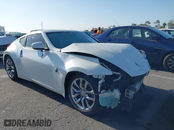 2014 Nissan 370Z Touring with VIN JN1AZ4EH7EM635655, listed as a IAAI auction lot 42217280 with 150,200 mi miles and . Bid and sale history available at DreamBid. Image 1.