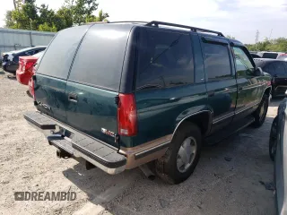 1998 GMC Yukon with VIN 1GKEK13RXWJ723572, listed as a Copart auction lot 65987314 with 237,503 mi miles and Salvage Title. Bid and sale history available at carsss.com. Image 3.