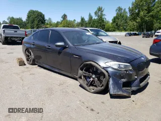 2013 BMW M5 z VIN WBSFV9C50DC774172, wystawiony jako Copart lot #61990854 z przebiegiem Nie podano mil oraz Szkoda całkowita • Salvage title. Historia ofert i sprzedaży dostępna na DreamBid. Obrazek 4.