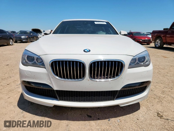 2013 BMW 7 Series 750Li с VIN WBAYE8C59DD134172, выставлен на аукционе Copart как лот 63624785 с пробегом 73 185 миль миль и Списание • Salvage title. История ставок и продаж доступна на DreamBid. Изображение 5.