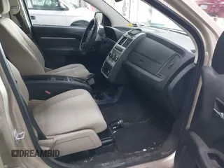 2010 Dodge Journey SXT with VIN 3D4PH5FVXAT180831, listed as a IAAI auction lot 41506328 with 155,482 mi miles. Bid and sale history available at carsss.com. Image 5.