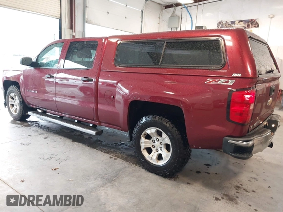 2014 Chevrolet Silverado 1500 LT with VIN 3GCUKREC9EG358476, listed as a IAAI auction lot 41866756 with 210,880 mi miles and . Bid and sale history available at DreamBid. Image 3.