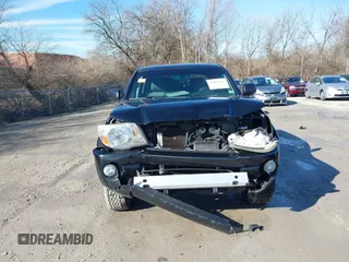 2009 Toyota Tacoma PreRunner with VIN 3TMJU62N99M074807, listed as a IAAI auction lot 41664211 with 230,481 mi miles. Bid and sale history available at carsss.com. Image 13.
