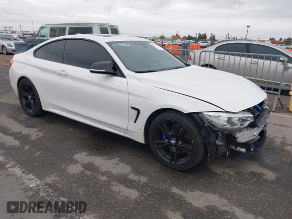 2014 BMW 4 Series 428i xDrive with VIN WBA3N5C56EK196702, listed as a IAAI auction lot 40934482 with 120,292 mi miles. Bid and sale history available at carsss.com. Image 1.