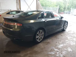 2015 Lincoln MKZ Hybrid z VIN 3LN6L2LU3FR620664, wystawiony jako IAAI lot #42362854 z przebiegiem 152 750 mil mil oraz . Historia ofert i sprzedaży dostępna na DreamBid. Obrazek 4.