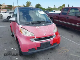 2009 Smart fortwo Pure z VIN WMEEJ31X59K245895, wystawiony jako IAAI lot #42266793 z przebiegiem 120 497 mil mil oraz . Historia ofert i sprzedaży dostępna na DreamBid. Obrazek 6.