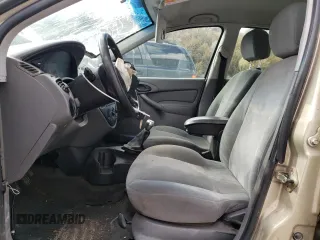 2000 Ford Focus LX with VIN 1FAFP33P8YW381773, listed as a Copart auction lot 80168174 with 151,410 mi miles and Salvage Title. Bid and sale history available at DreamBid. Image 7.