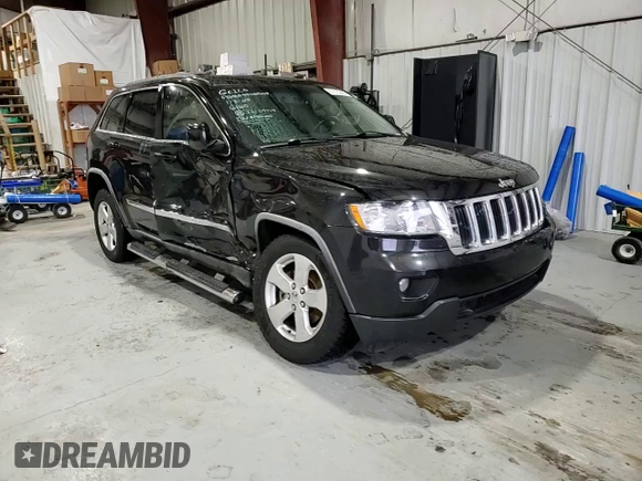 2012 Jeep Grand Cherokee Laredo with VIN 1C4RJEAG4CC146160, listed as a Copart auction lot 87515345 with 116,936 mi miles and Salvage Title. Bid and sale history available at carsss.com. Image 12.