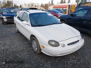 1999 Ford Taurus SE Standard with VIN 1FAFP58U5XG200924, listed as a IAAI auction lot 41501093 with 105,102 mi miles. Bid and sale history available at carsss.com. Image 1.