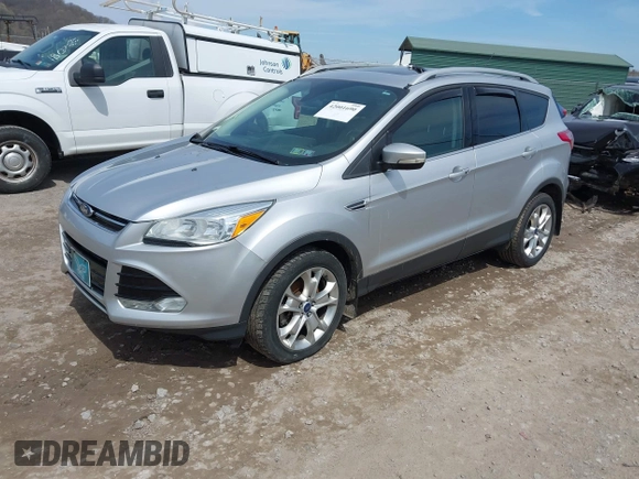 2016 Ford Escape Titanium with VIN 1FMCU9JX3GUA62802, listed as a IAAI auction lot 42001690 with 124,452 mi miles. Bid and sale history available at carsss.com. Image 17.