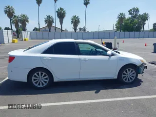2012 Toyota Camry XLE z VIN 4T1BD1FK0CU007194, wystawiony jako IAAI lot #42281914 z przebiegiem 186 379 mil mil oraz . Historia ofert i sprzedaży dostępna na DreamBid. Obrazek 14.