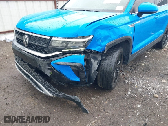2023 Volkswagen Taos SE z VIN 3VVNX7B28PM305652, wystawiony jako IAAI lot #41892522 z przebiegiem 50 644 mil mil oraz . Historia ofert i sprzedaży dostępna na DreamBid. Obrazek 6.