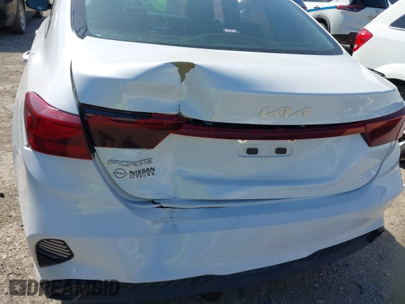 2022 Kia Forte LXS z VIN 3KPF24AD1NE479654, wystawiony jako IAAI lot #41950997 z przebiegiem 71 168 mil mil oraz . Historia ofert i sprzedaży dostępna na DreamBid. Obrazek 6.