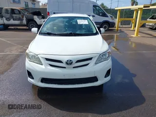 2012 Toyota Corolla L with VIN 2T1BU4EE2CC863515, listed as a IAAI auction lot 41561307 with 99,749 mi miles. Bid and sale history available at carsss.com. Image 13.