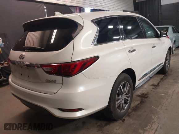 2016 Infiniti QX60 with VIN 5N1AL0MM0GC511950, listed as a IAAI auction lot 41690626 with 102,198 mi miles and . Bid and sale history available at DreamBid. Image 4.