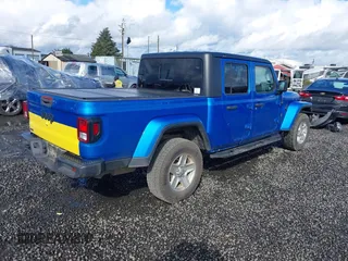 2022 Jeep Gladiator Willys z VIN 1C6JJTAM4NL130350, wystawiony jako IAAI lot #41964484 z przebiegiem Nie podano mil oraz . Historia ofert i sprzedaży dostępna na DreamBid. Obrazek 4.